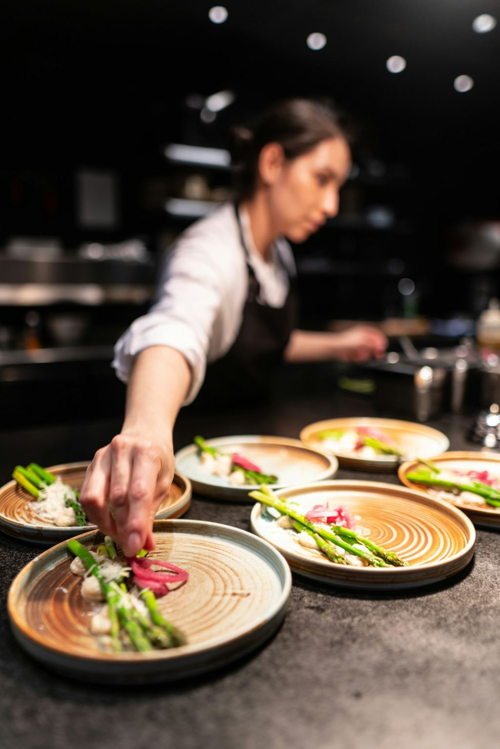 Chef preparing food in a commercial kitchen