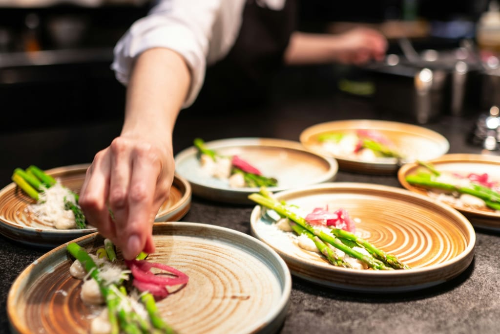 Chef preparing food in a commercial kitchen